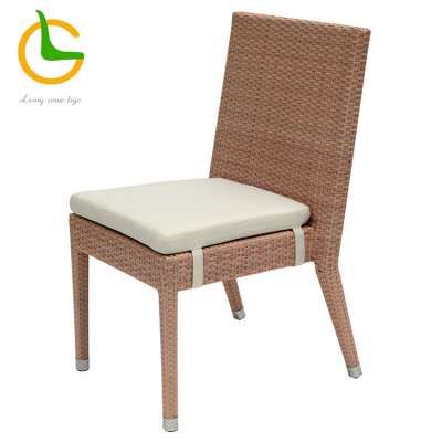 Contemporary imported rattan dining chairs with cushions